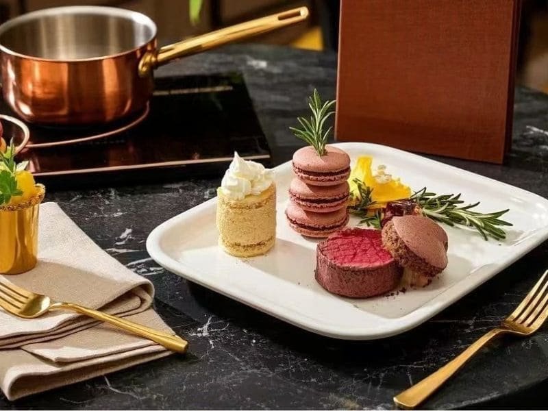 White Melamine Tray With Assorted Desserts Displayed On Black Marble Table