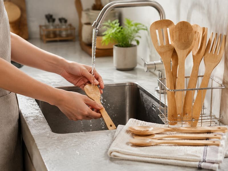 Solid bamboo utensil care showing handwashing and drying