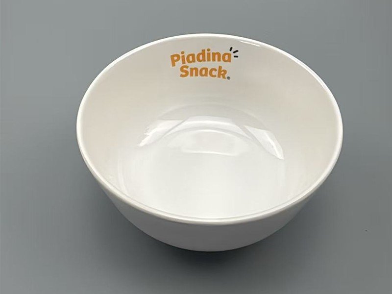 White melamine serving bowl with a custom printed restaurant logo